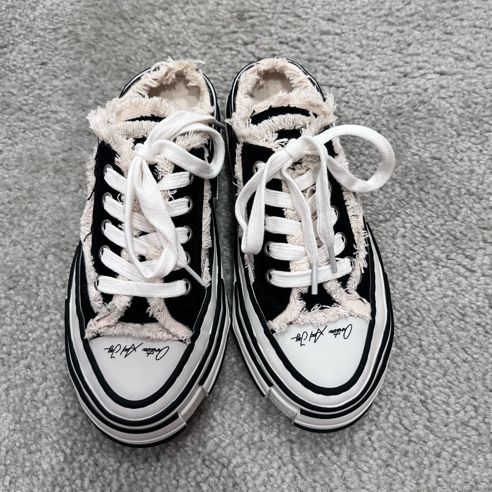 Black distressed sneaker